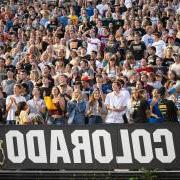 Fans cheer on the Buffs in a packed Folsom Field stadium