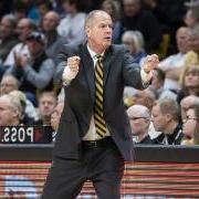 Men's basketball head coach Tad Boyle on sidelines