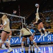 CU volleyball team on the court